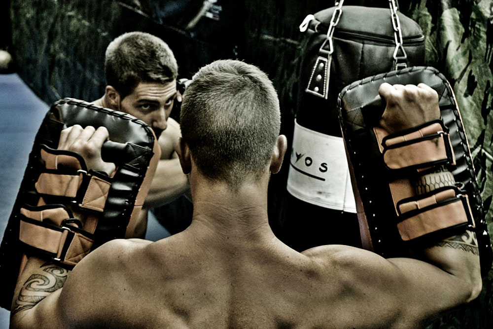 Krav Maga Training striking workout with pads with expert padman